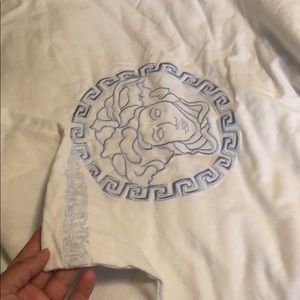 Blue Versace blanket and onesies to match